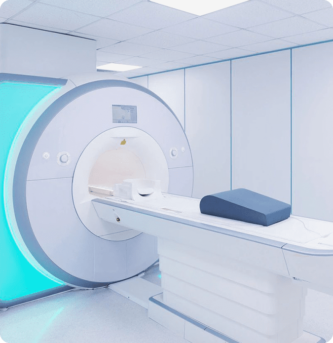 A room with a large mri machine and a table